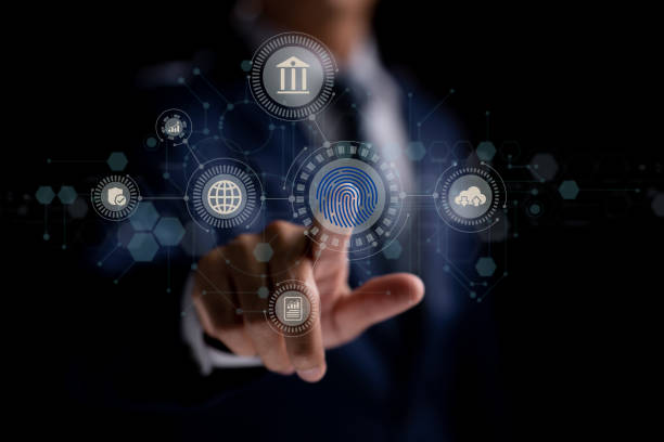 istock Man uses thumb to scan fingerprint or for digital processing biometric identification to access to the security system, which includes internet banking, cloud computing. Cybersecurity concept. 1364217983
