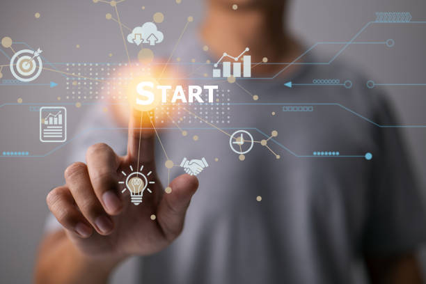 istock On a modern virtual interface, there is a startup concept with an icon business and a network connection. Man touches on the start. 1364218191