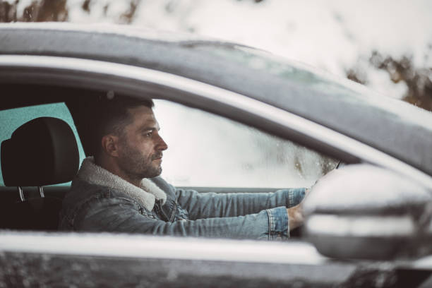 istock A handsome young man travels through a snow-covered forest 1364220073