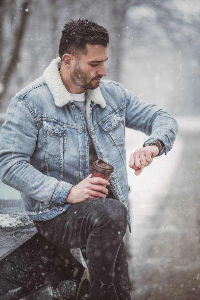 istock A handsome young man travels through a snow-covered forest 1364220366