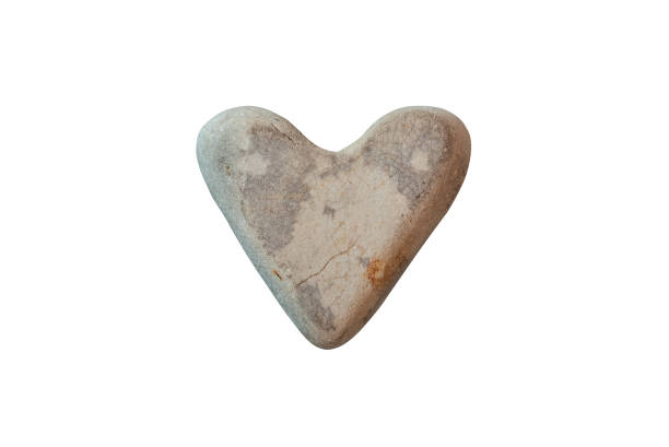 istock Heart shaped gray stone isolated on white background 1364220934