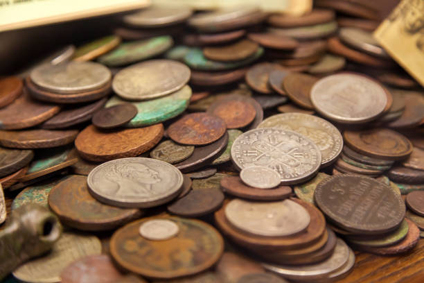 istock Pile of ancient coins, selective focus 1364222818
