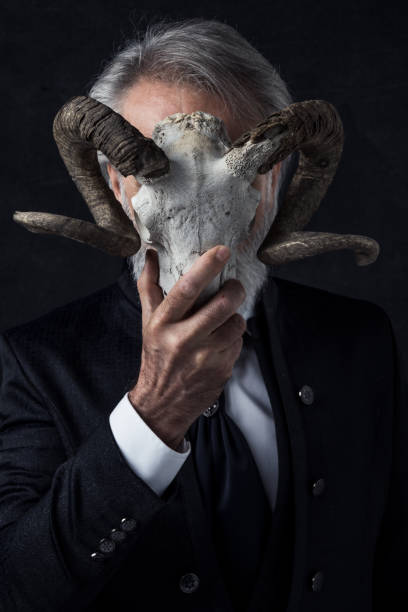 istock Businessman with goat skull 1364224577