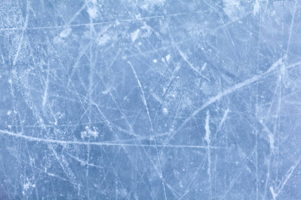 istock Empty ice rink with skate marks after the session outdoor. 1364225330