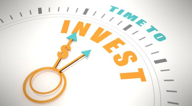 istock Time to invest words on clock face. 3D Render 1364227308