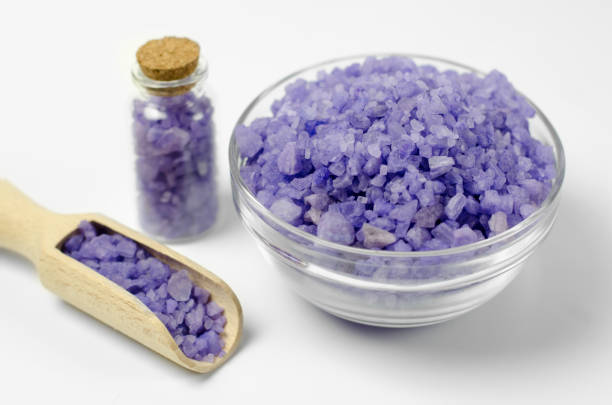 Lavender sea salt on light background, selective focus