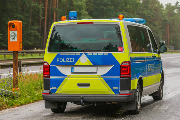 istock Police car in an emergency bay on a motorway 1364236330