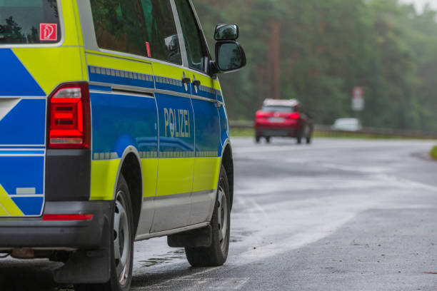 istock View past a police car to the highway 1364236567