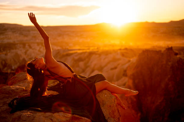 istock Young woman doing therapy at sunset 1364236798