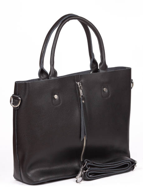 istock Black large with strap leather woman's handbag isolated on white background 1364238137