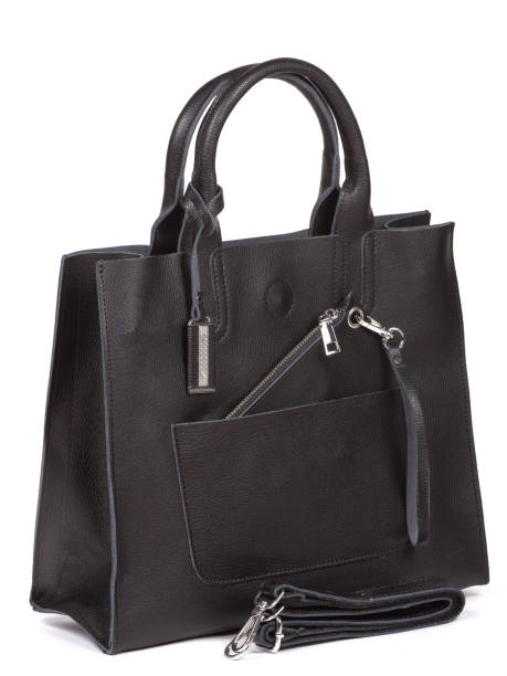 istock Black large with strap leather woman's handbag isolated on white background 1364238211