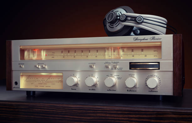 istock Vintage Stereo Component Receiver Front Panel with warm scale and VU meters backlight and headphones 1364243511
