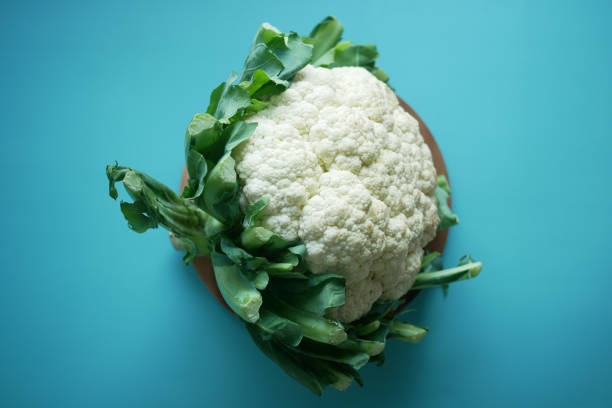istock top view of Cauliflower on light green background 1364251105