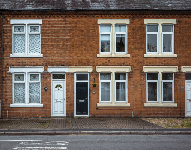 English terraced houses red brik terraced housing in England row house stock pictures, royalty-free photos & images