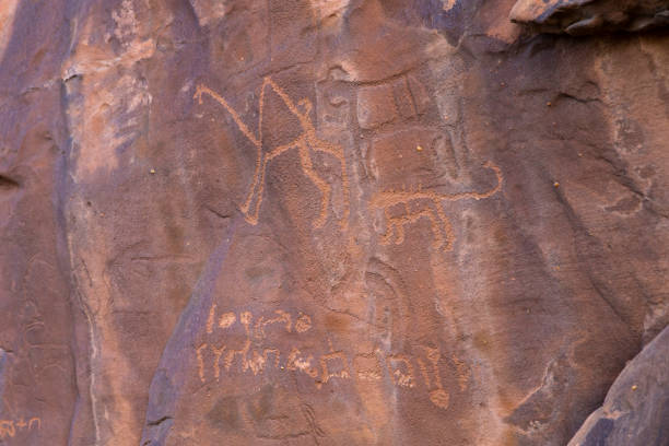 istock petroclyphs on a cave wall in Saudi Arabia 1364252363