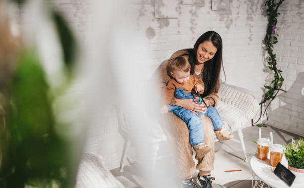 istock Mom and son enjoy the cafe 1364252693