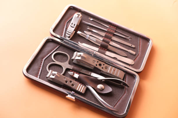 istock nail cutters for a manicure on orange background 1364252724