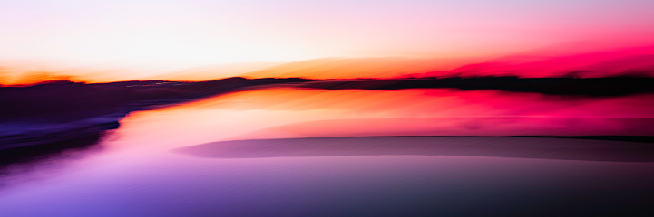 Abstract soft and vibrant seascape backdrop image for sunrise, sunset, twilight, and inspiring sky and ocean themes.