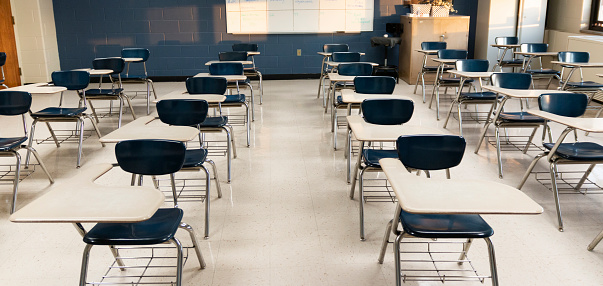 A high school classroom is with only desks ready to reopen and bring the students back during Covid-19 pandemic.