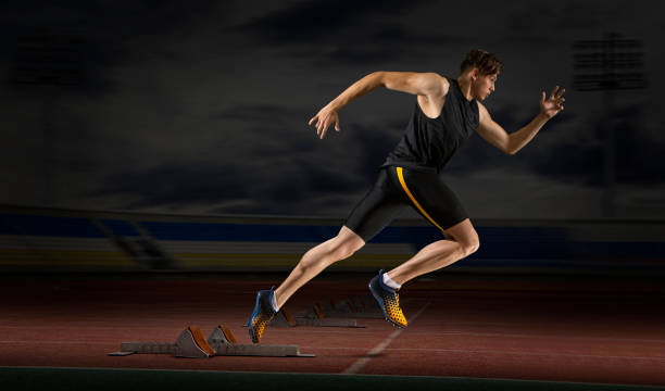istock Professional sprinter training at the stadium in the evening 1364255114