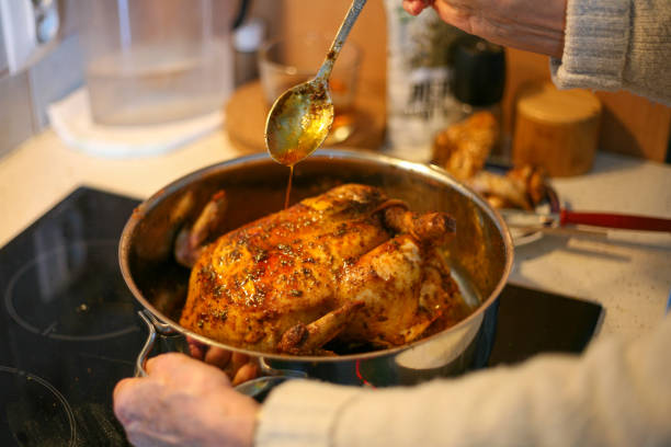 istock Preparation - frying homemade chicken in a pan 1364256510