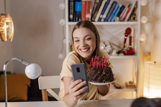istock Wishing a birthday wish and communication on a video call 1364256770