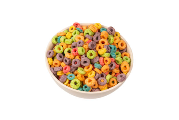 istock Colorful rings cereal spill out into a bowl. Breakfast. Isolated. 1364257416