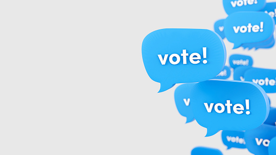 Vote text on 3D social media blue speech bubbles on a white background