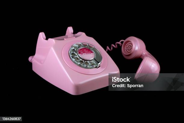 Vintage Pink Telephone On A Black Background Stock Photo - Download Image Now - Pink Color, Rotary Phone, Old