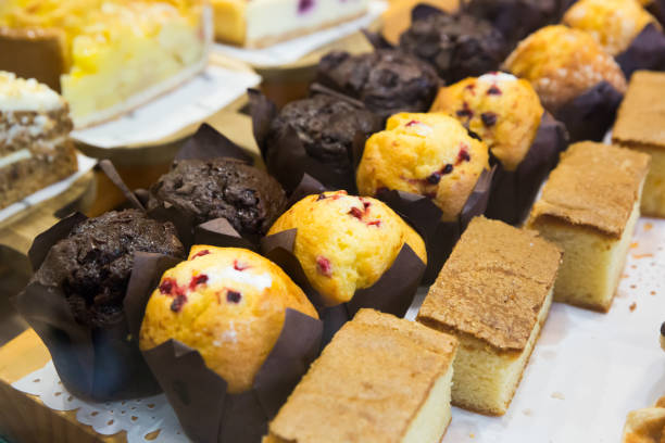 istock Berry muffins and chocolate muffins 1364263223