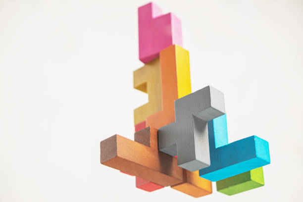 istock Abstract construction from wooden blocks. The concept of logical thinking. 1364265412
