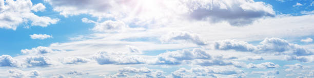 istock Blue sky with soft white clouds in sunny day 1364268899