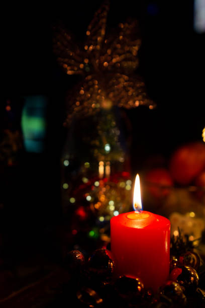 christmas candles burning in the dark