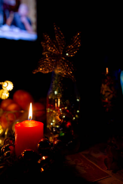 istock christmas candles burning in the dark 1364270999