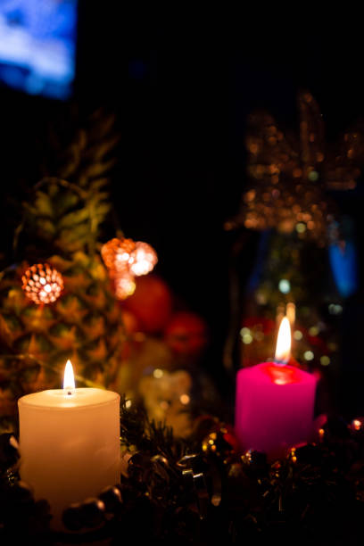 christmas candle burns in the dark