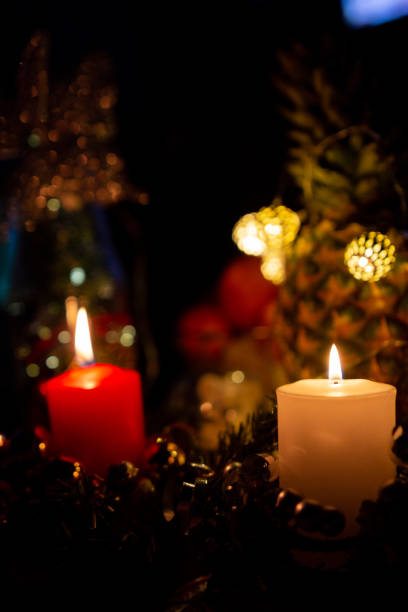 istock christmas candles burning in the dark 1364271008