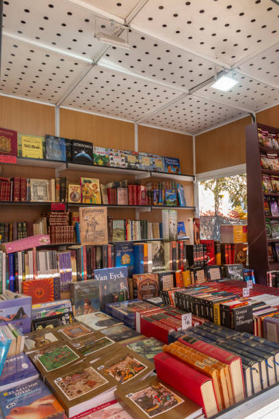 books in an outdoor bookstore in alcala de henares Alcala de Henares, Madrid, SPAIN - October 10, 2019 : Closeup of books at the old and second-hand book fair of Alcala de Henares. the book fair is held annually by the alcala de henares city council alcala de henares stock pictures, royalty-free photos & images