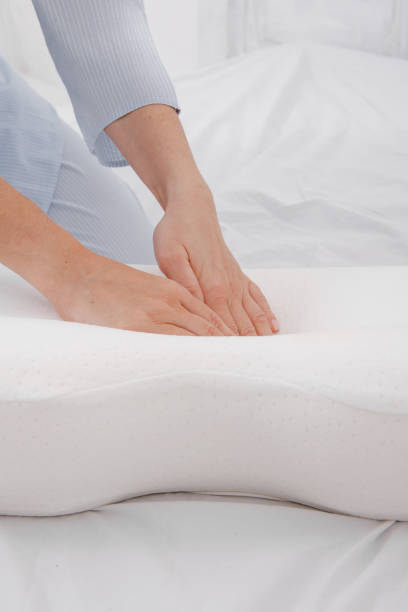 istock Orthopedic Pillow with a Memory Effect. Medical treatment pillow for sleep. Comfort Memory Pillow under the head with a recess under the shoulder isolated on white background. Sleeping Support Pillow 1364271358