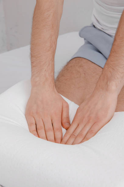 istock Orthopedic Pillow with a Memory Effect. Medical treatment pillow for sleep. Comfort Memory Pillow under the head with a recess under the shoulder isolated on white background. Sleeping Support Pillow 1364272059