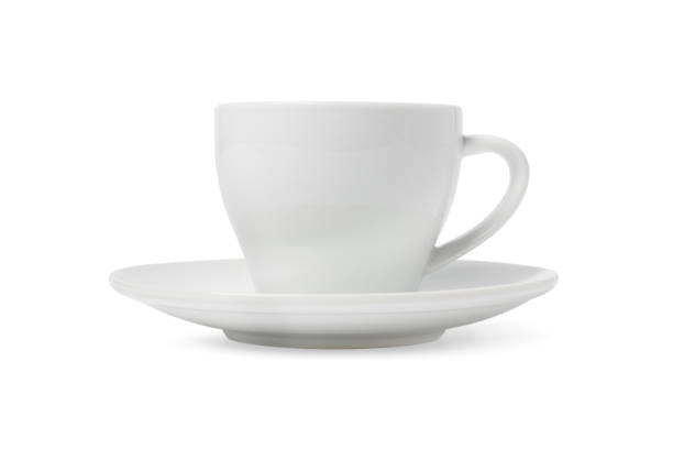istock White tea cup and saucer for drink isolated on white background. Ceramic coffee cup or mug close up. Mock-up classic porcelain utensils. Blank ceramic mug mockup template for branding on white 1364273701