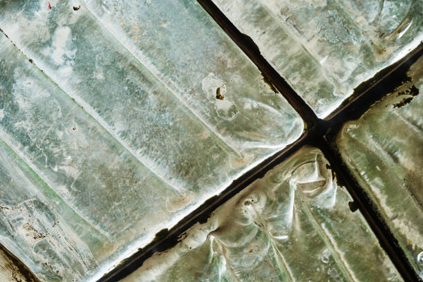 istock Colored glass mosaic close-up with sunlight passing through. Abstract background 1364275931