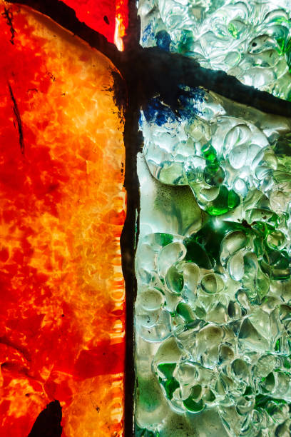 istock Colored glass mosaic close-up with sunlight passing through. Abstract background 1364276026