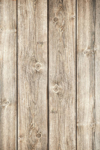 istock Wood color texture vertical for background. Surface light clean of table top view. Natural patterns for design art work and interior or exterior. Grunge old white wood board wall pattern 1364276254