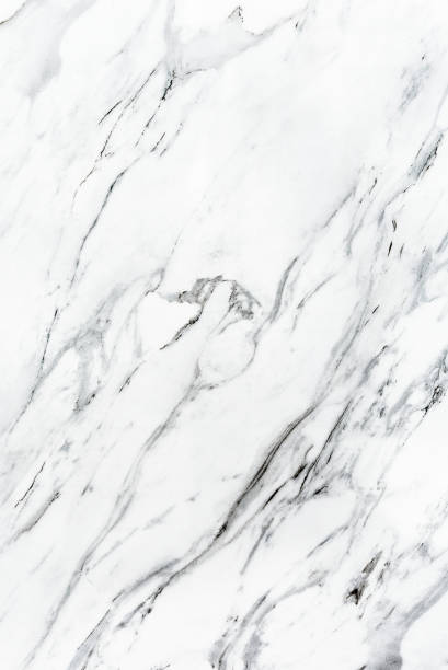 istock White marble vertical texture background pattern top view. Tiles natural stone floor with high resolution. Luxury abstract patterns. Marbling design for banner, wallpaper, packaging design template 1364276817
