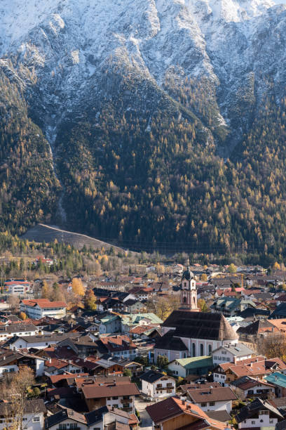 istock Church and mountains in Mittenwald, Germany 1364277212