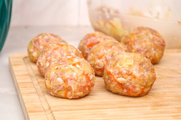 Meatballs and Fried Potatoes Served On a Plate