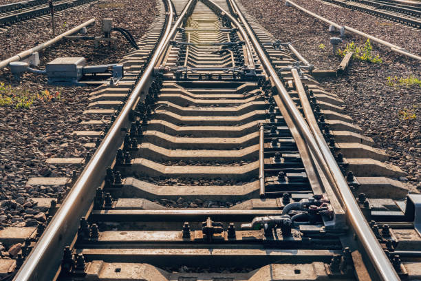 railway tracks on the big station. - railroad spikes imagens e fotografias de stock