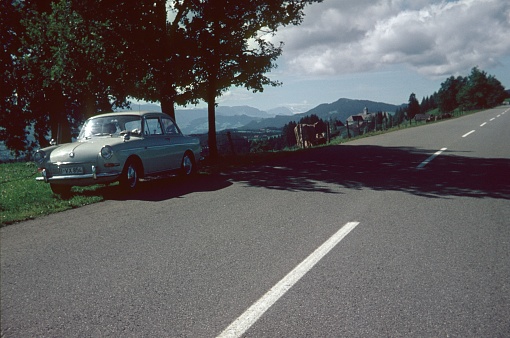 Kufstein, Tyrol, Austria, 1970. Driving break at the roadside in the Austrian Alps.