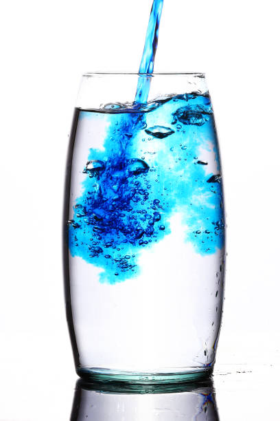 istock blue liquid splash in flower vase 1364287122