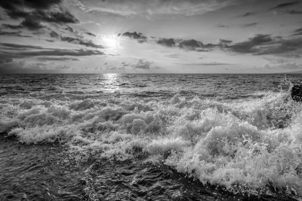 istock Ocean Beach Wave Sunset Black And White 1364288154